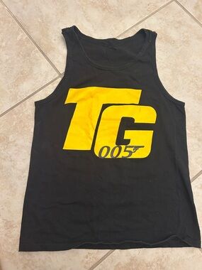 TG Black Tank Top with Bold Yellow OO5 Graphic